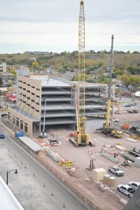 Cranes work on multi-story building in downtown rapid city