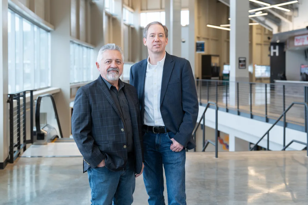 Marty Christensen (right) will replace Doug Feterl (left) as President of West Plains Engineering. Photo credit: Kevin Eilbeck Photography