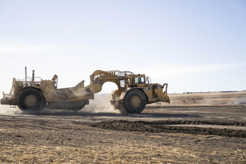 Caterpillar machinery moving dirt