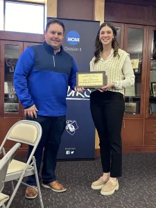 Dustin Hamilton with HDR Engineering Accepts Award from Maggie Sebert