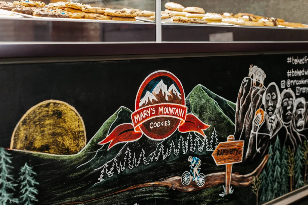 Mary's Mountain Cookies display case chalk drawing