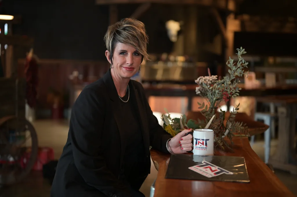 Tif Taylor-Robertson holds t-n-t events and marketing management mug