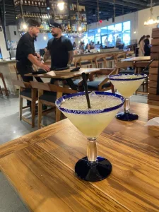 a margarita sits on a table at ma cualli