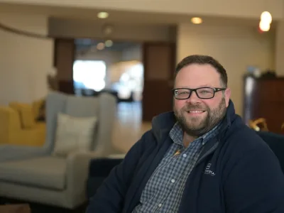 Clint Cox in lobby of Comfort Suites in Rapid City