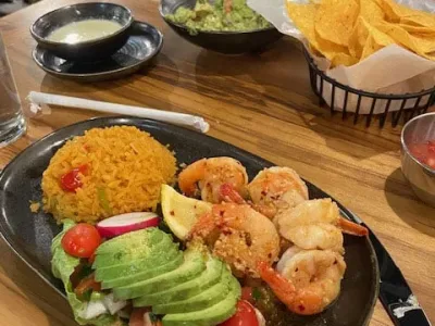 ma cualli dish features fice, avocado and shrimp